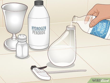Can you use vinegar and peroxide to rust metal?