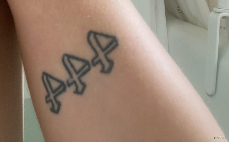 How to cover a 444 tattoo?